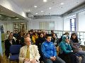 Zuhoerer bei der Podiumsdiskussion